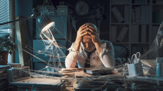 Business owner feeling overwhelmed by complex financial data and processes